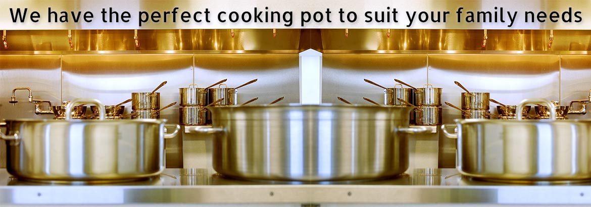 A range of polished cooking pots in a kitchen